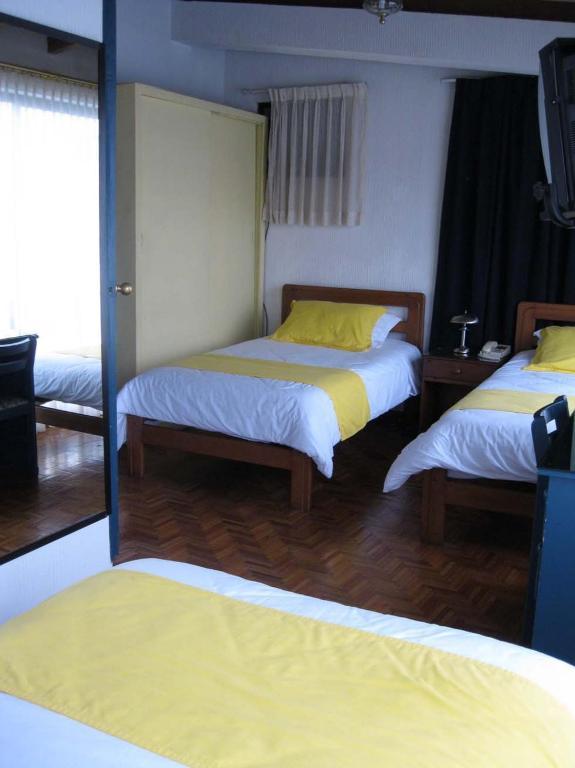 Hotel Rincón Escandinavo Quito Quarto foto